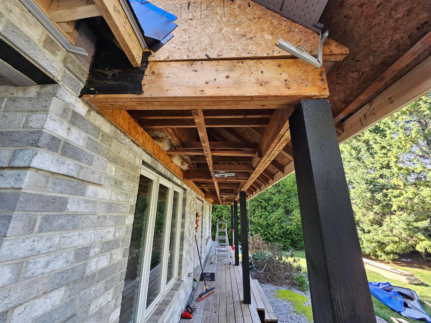 Soffit and fascia stripped back to the roof framing