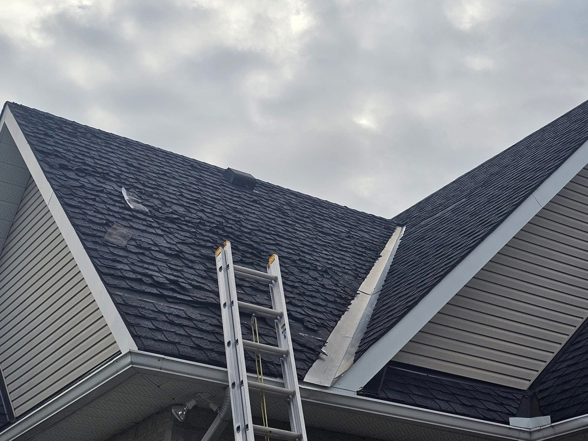 Old asphalt roof before replacement