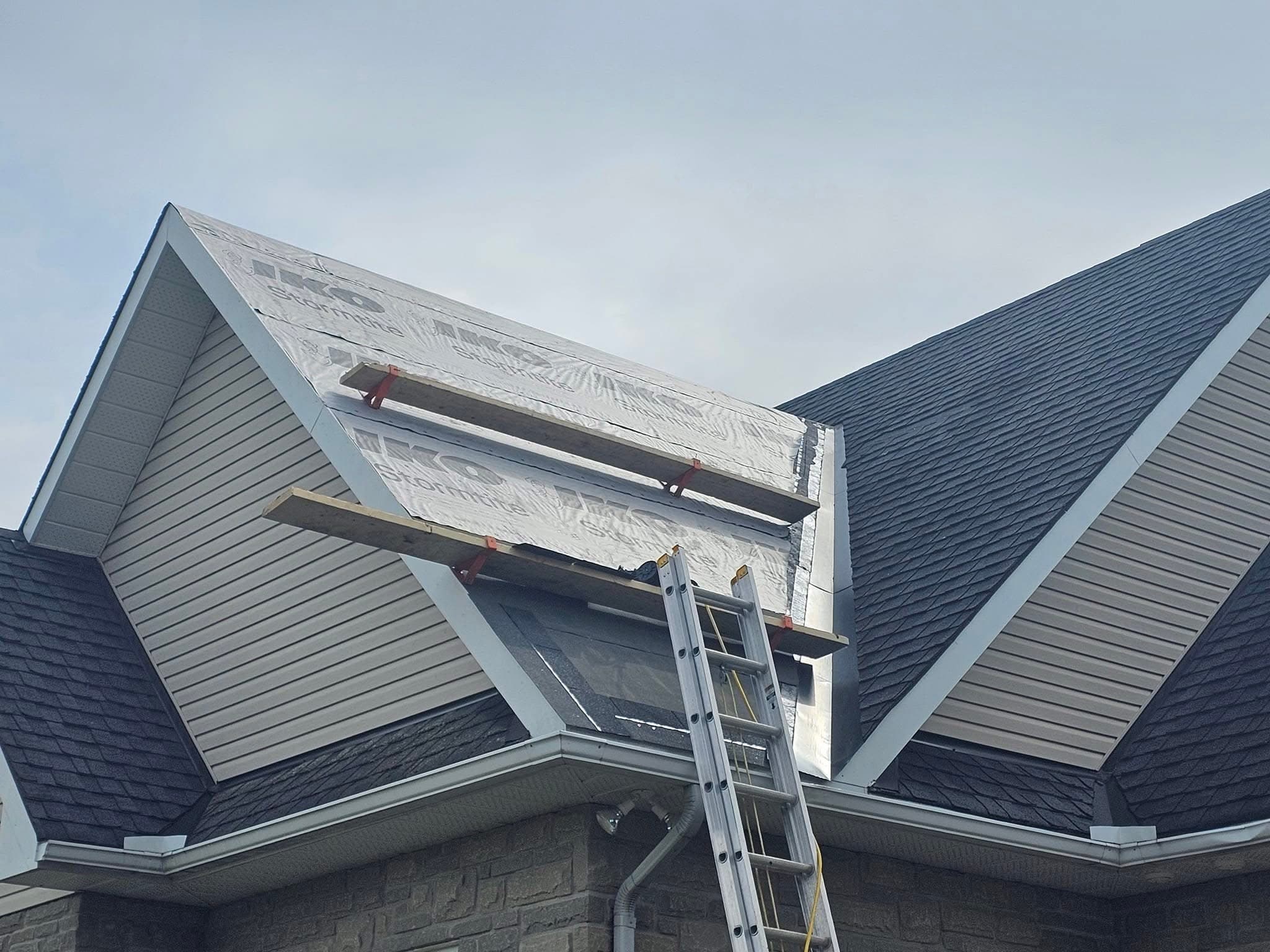 New shingles being installed