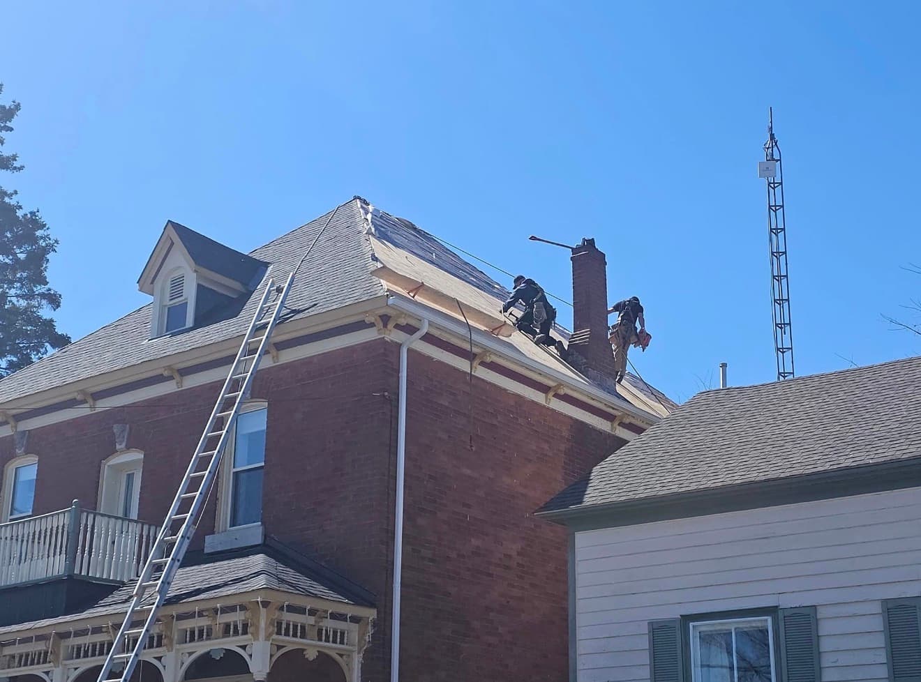 Roof reshingle in progress
